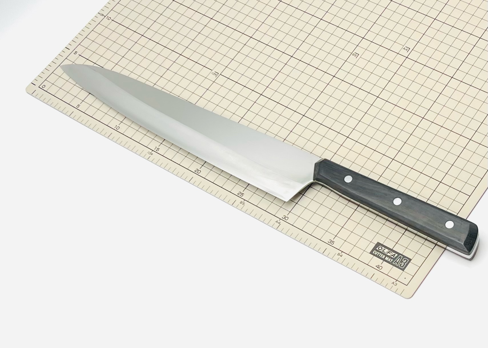 リベット止め黒檀柄 銀三ステンレス 牛刀 - 画像 (5)